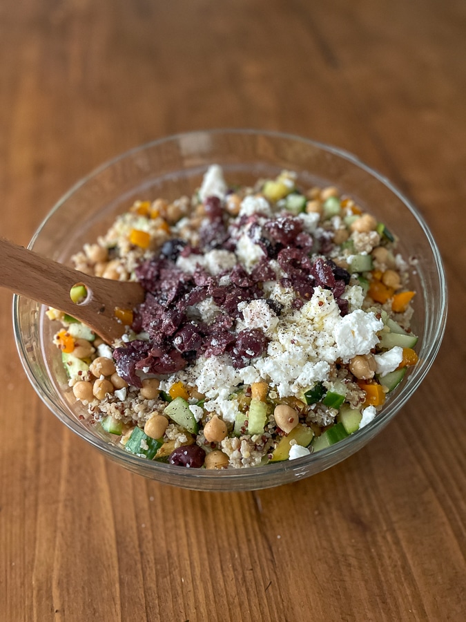 glass mixing bowl with salad