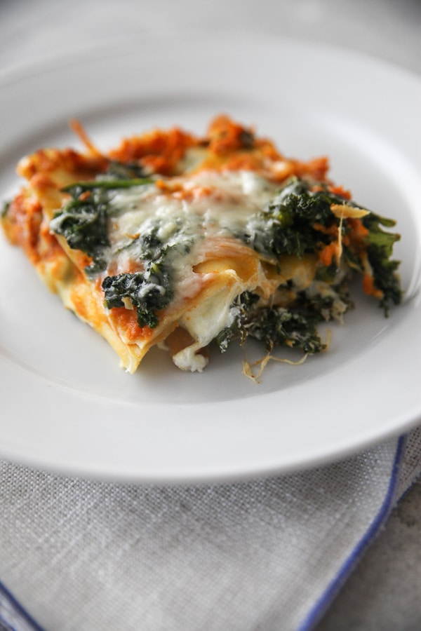 pumpkin goat cheese and kale lasagna on a plate