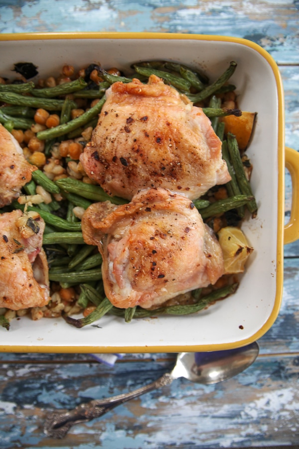 chicken thighs roasted over beans