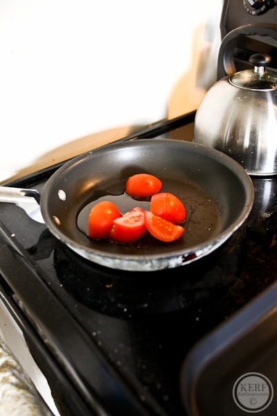 Salvadoran Breakfast fried tomatoes in pan