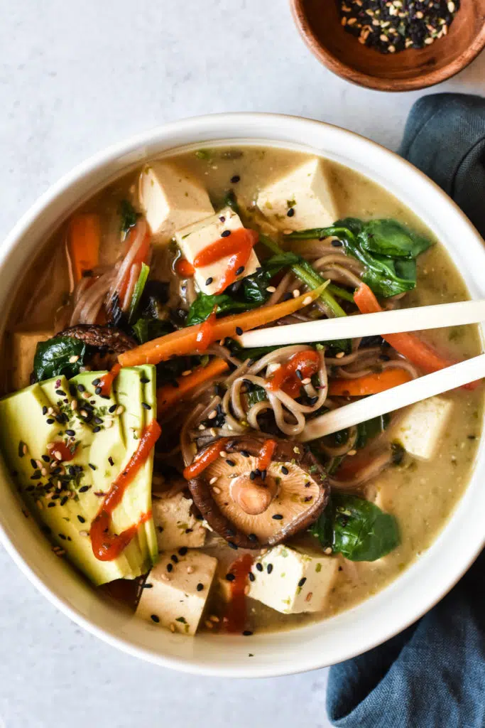 miso noodle soup in a bowl with chopsticks