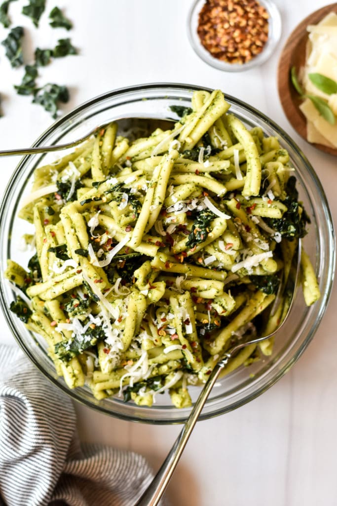 bowl of pasta salad with kale and pesto