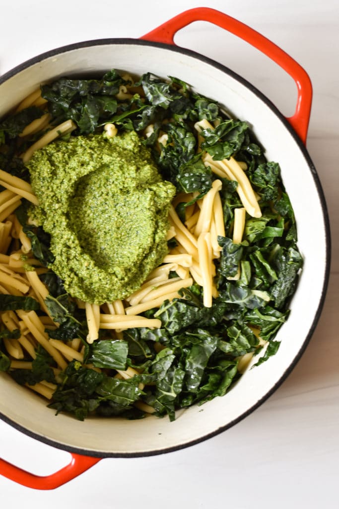pasta with kale and pesto in dutch oven