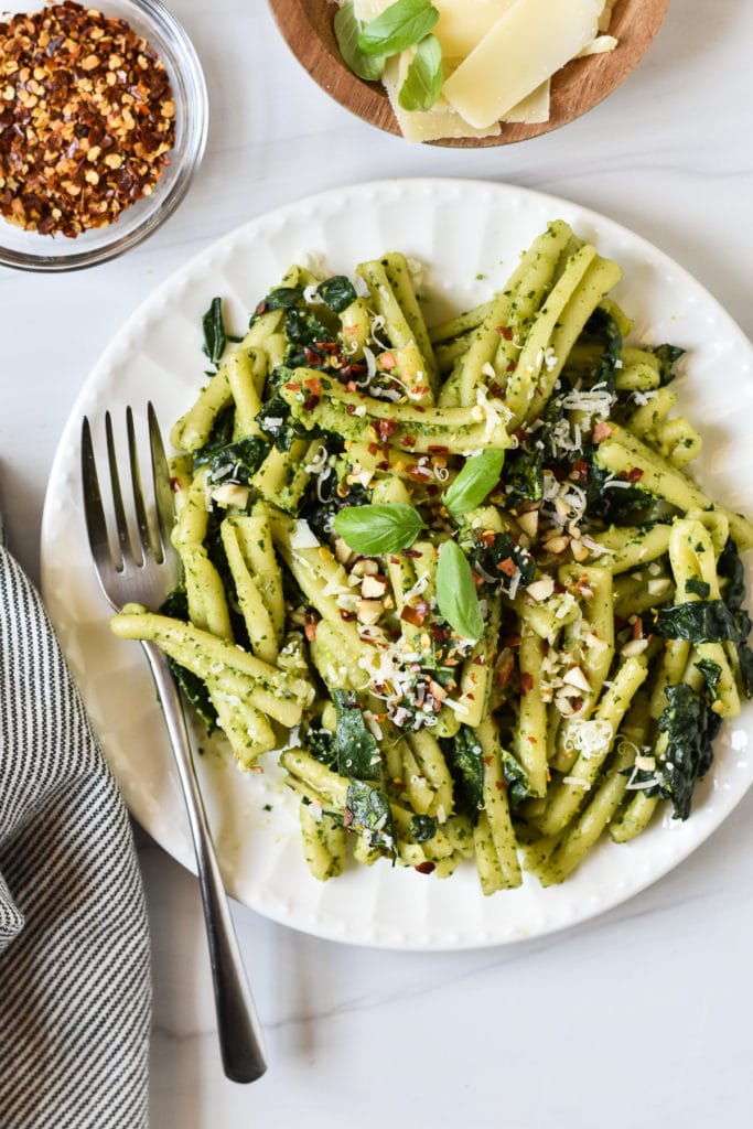 pasta salad with kale and pesto on a plate