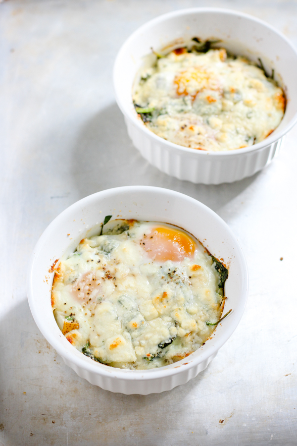 two ramekins of baked eggs