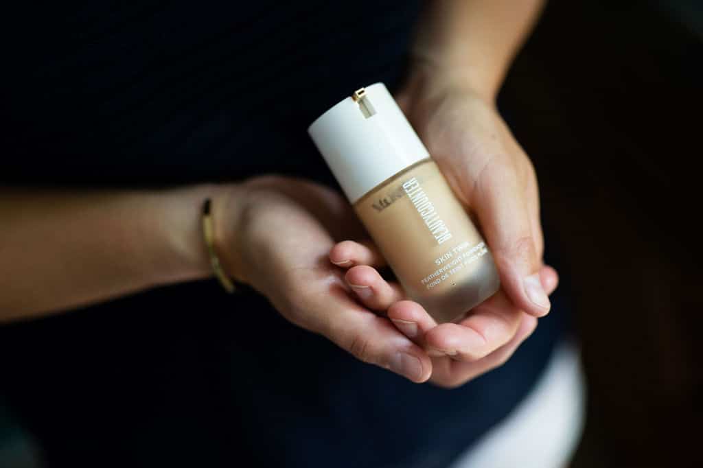 skin twin foundation by beautycounter in hands