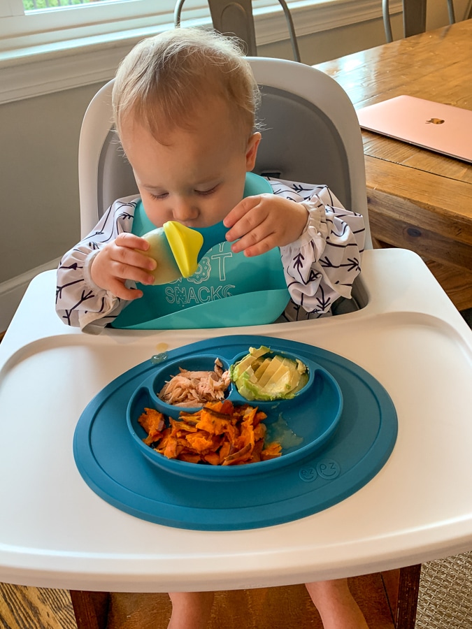 baby eats real food with silicone tray