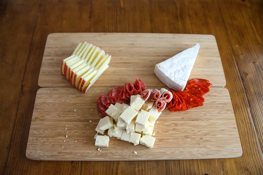 cheeses on board plus meats