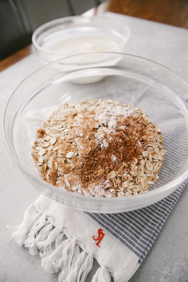 pineapple upside-down baked oatmeal ingredients in a mixing bowl