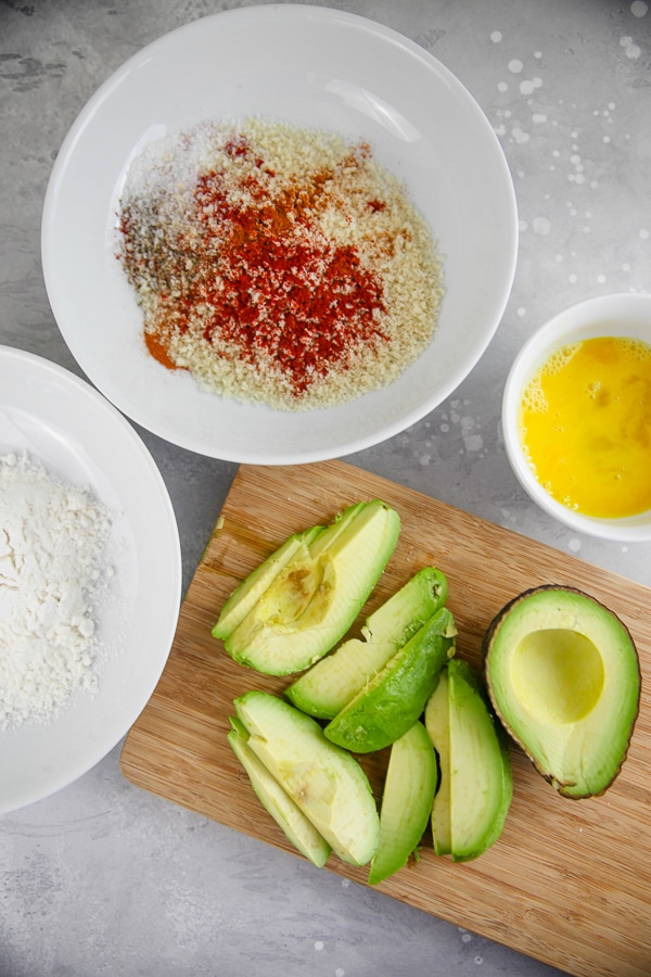 Pour flour, egg, and panko into three separate bowls.