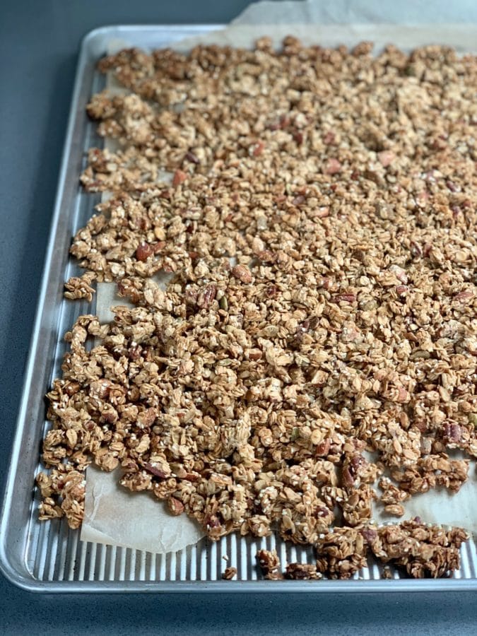 Full stainless steel sheet pan of Crunchy Tahini Granola.