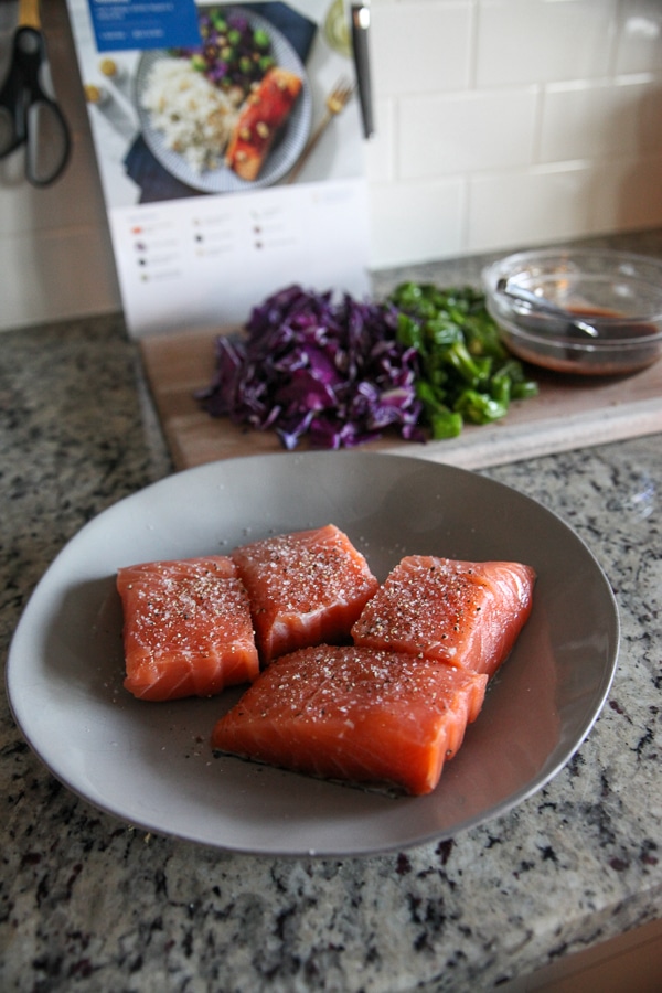 Blue Apron salmon seasoned on a plate