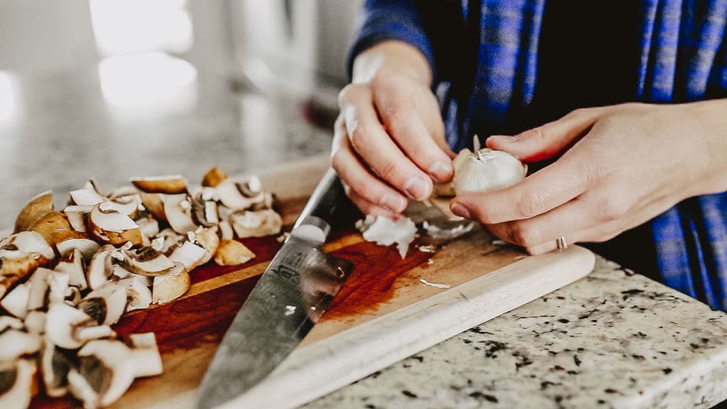 peeling garlic