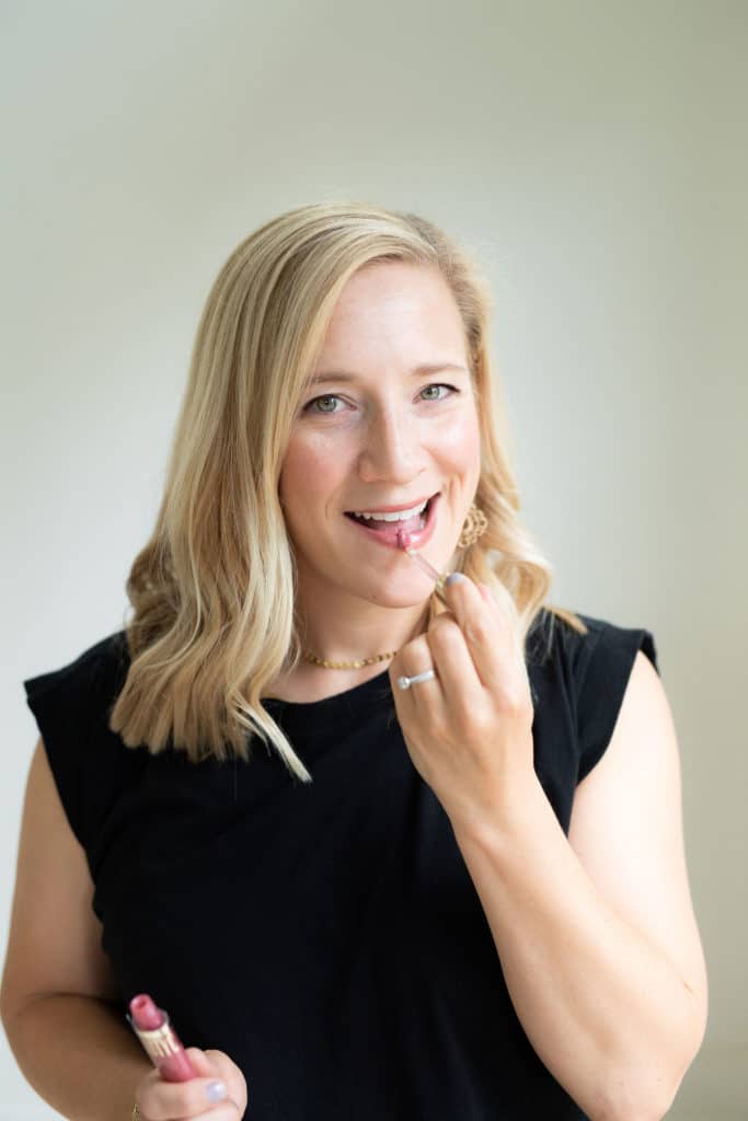 Kath applying Beautycounter Beyond Gloss