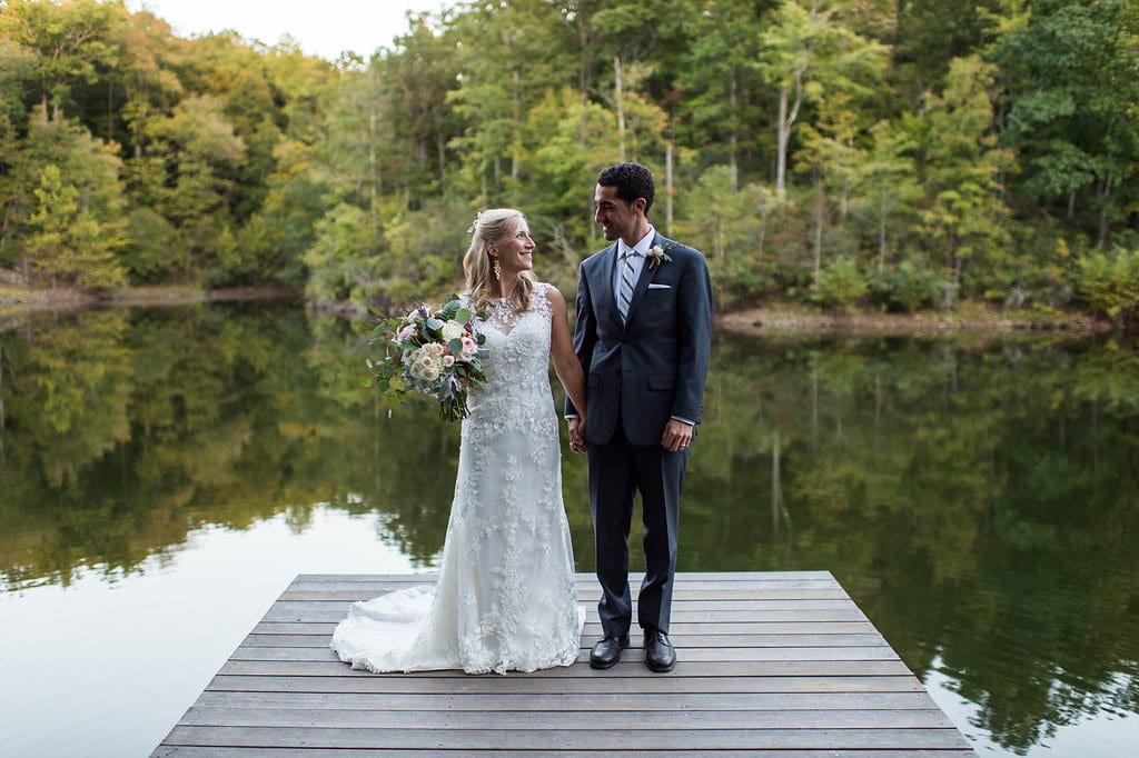 kath and thomas standing on a dock