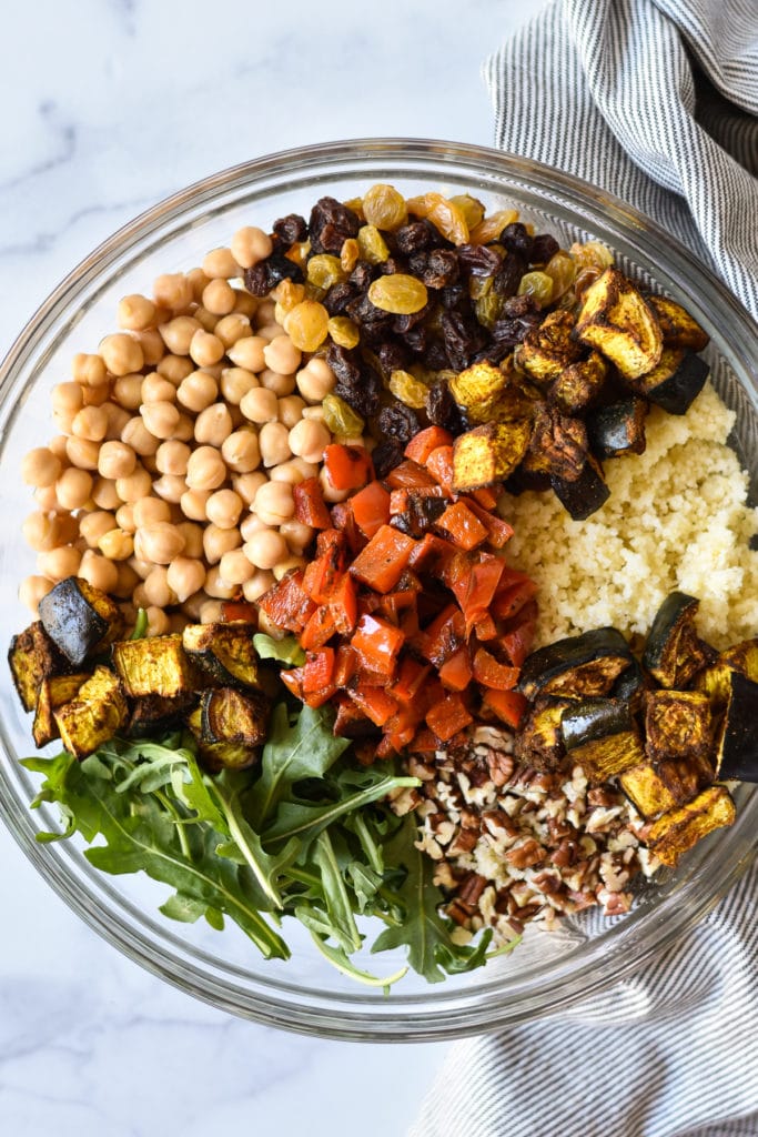ingredients for millet salad in a large bowl