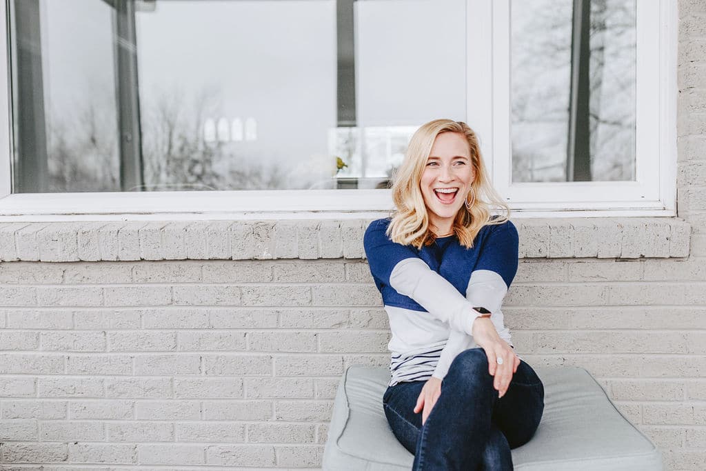 Kath smiling - sitting outside