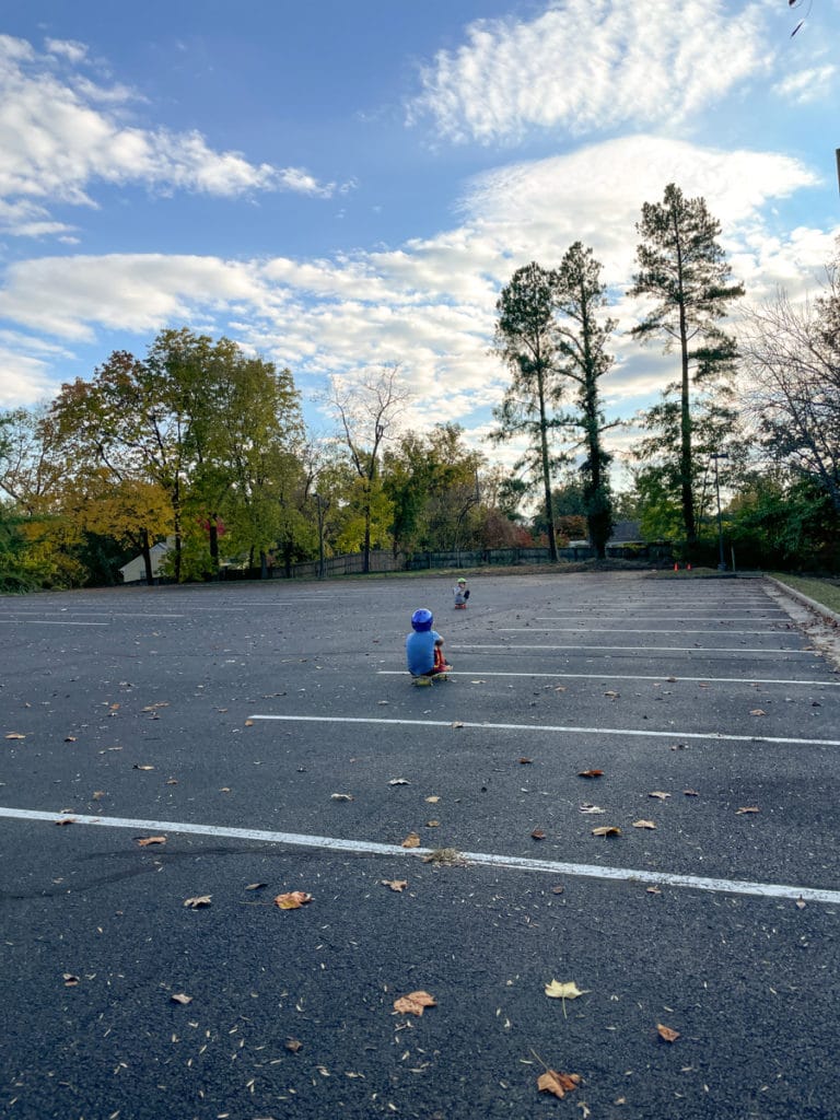 Skateboarding at parking lot