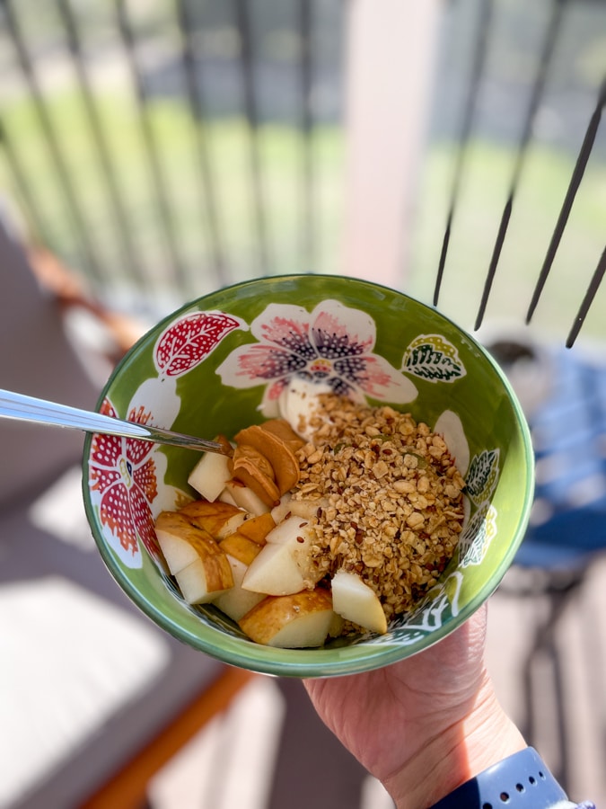 Greek yogurt bowl with granola, peanut butter, and pears! 