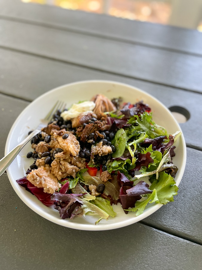 Carnitas over salad