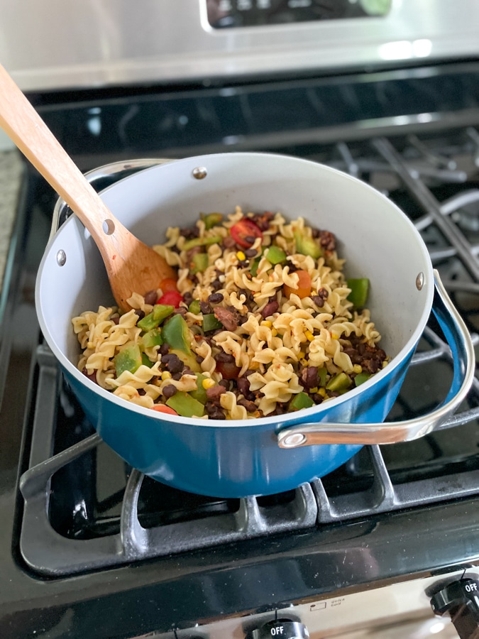 Mixing pasta with beans