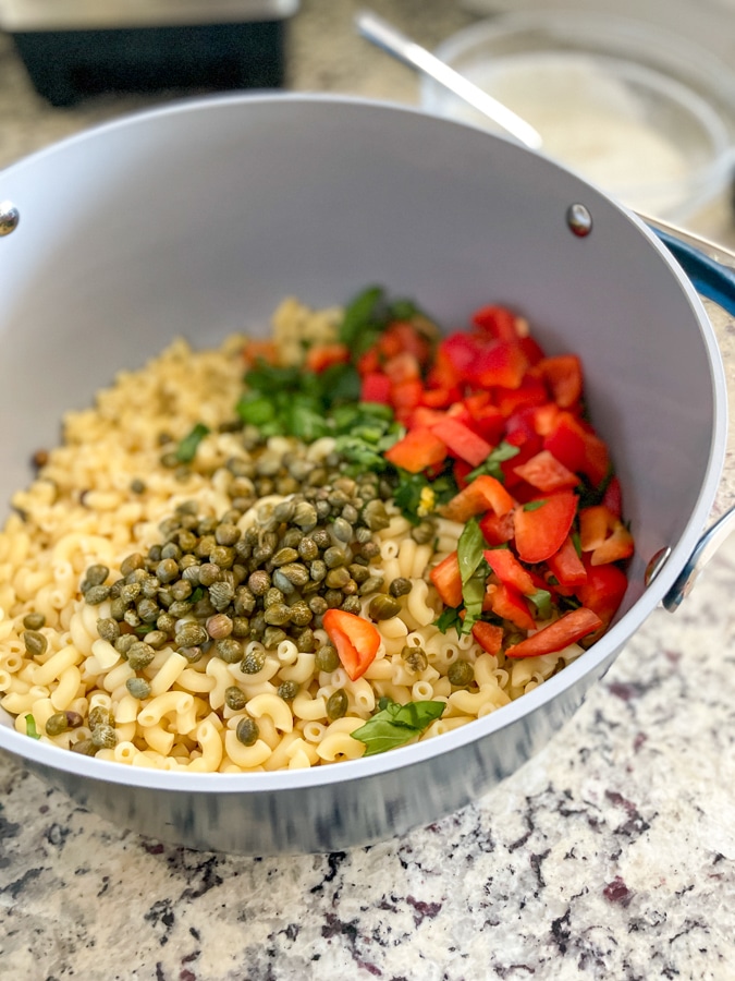 Mix pasta salad together