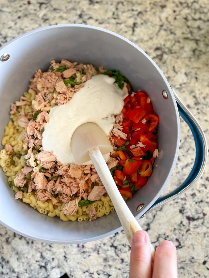 Stir dressing in pasta salad