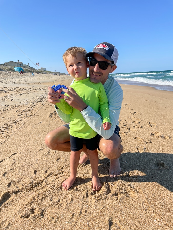 dad and son at the beach