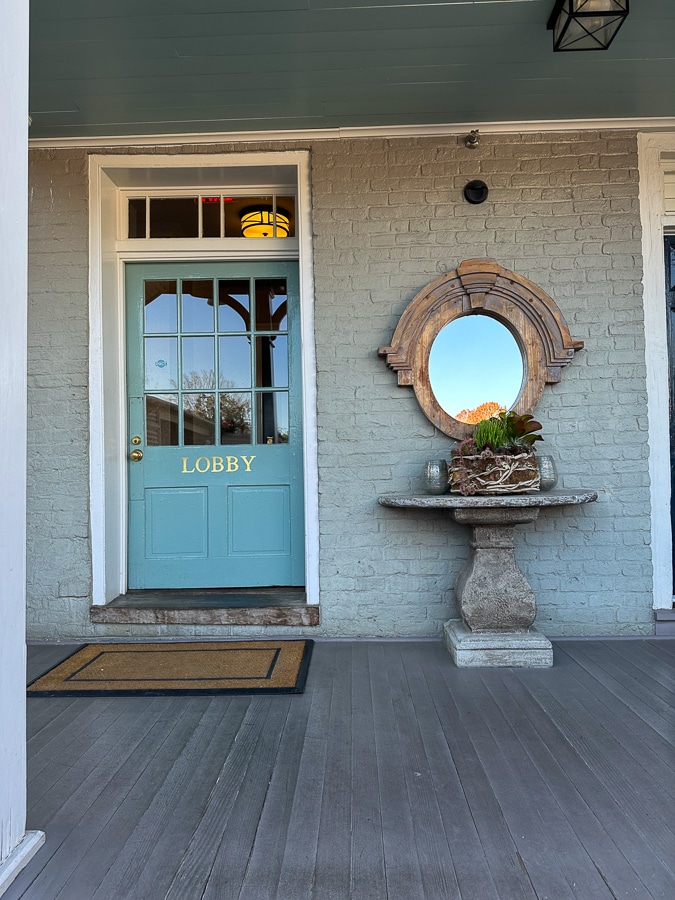 The Georges in Lexington lobby door