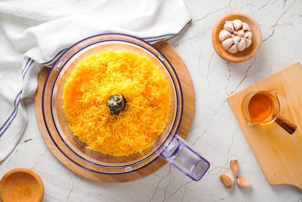 Grate cheddar cheese
