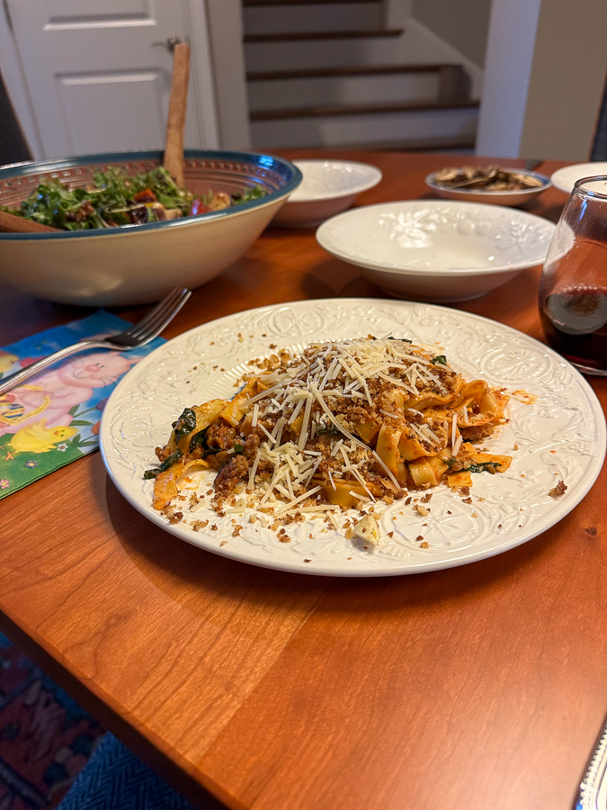 fettuccine with sausage and spinach plus salad