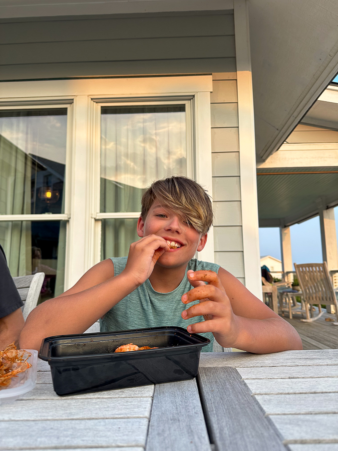 Mazen eating shrimp
