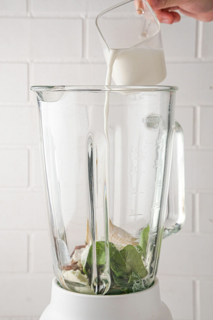 pouring milk in blender