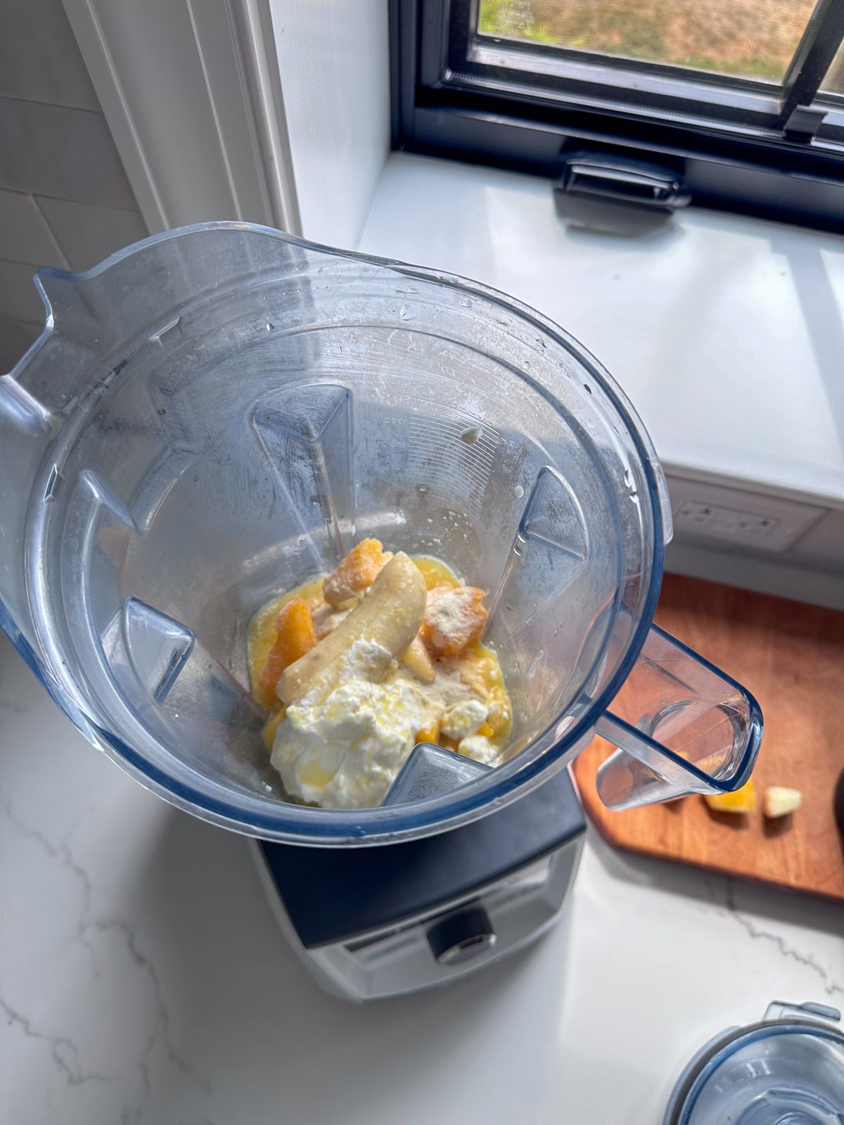 Mango Pineapple Smoothie ingredients in blender