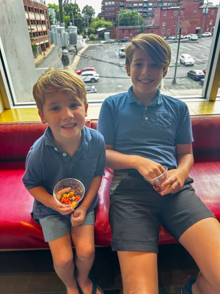 Kath Eats Blogger Kath Younger shares their Virginia Theater Festival + KERF Vacay - in photo: two kids eating candies