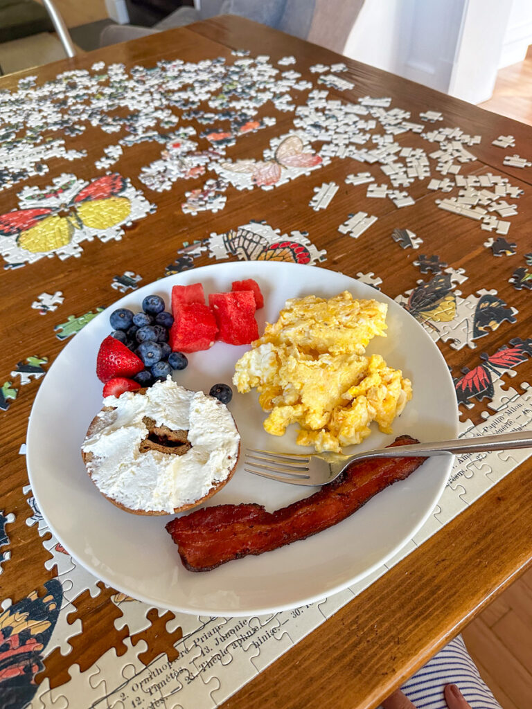Kath Eats Blogger Kath Younger shares their Virginia Theater Festival + KERF Vacay - in photo: puzzles on a table and a plate with food