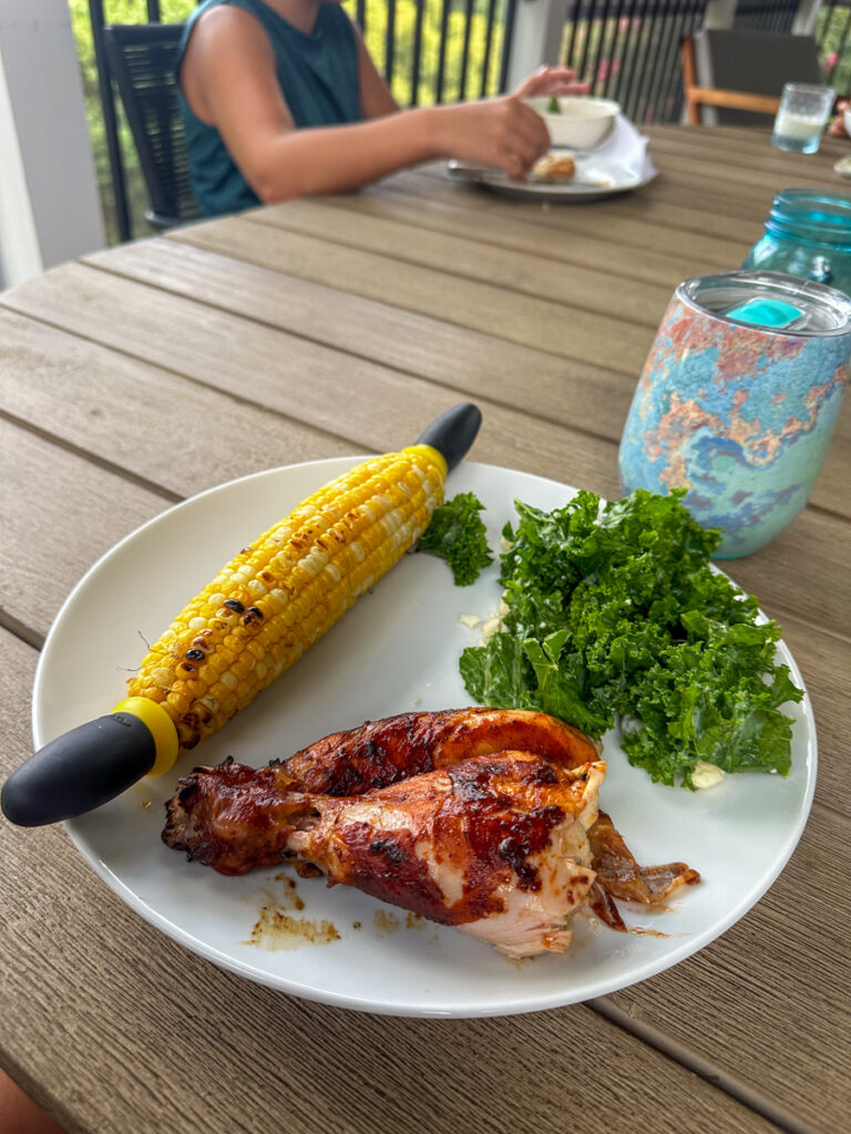 Kath Eats Blogger Kath Younger shares their Virginia Theater Festival + KERF Vacay - in photo: a plate with corn, chicken and salad
