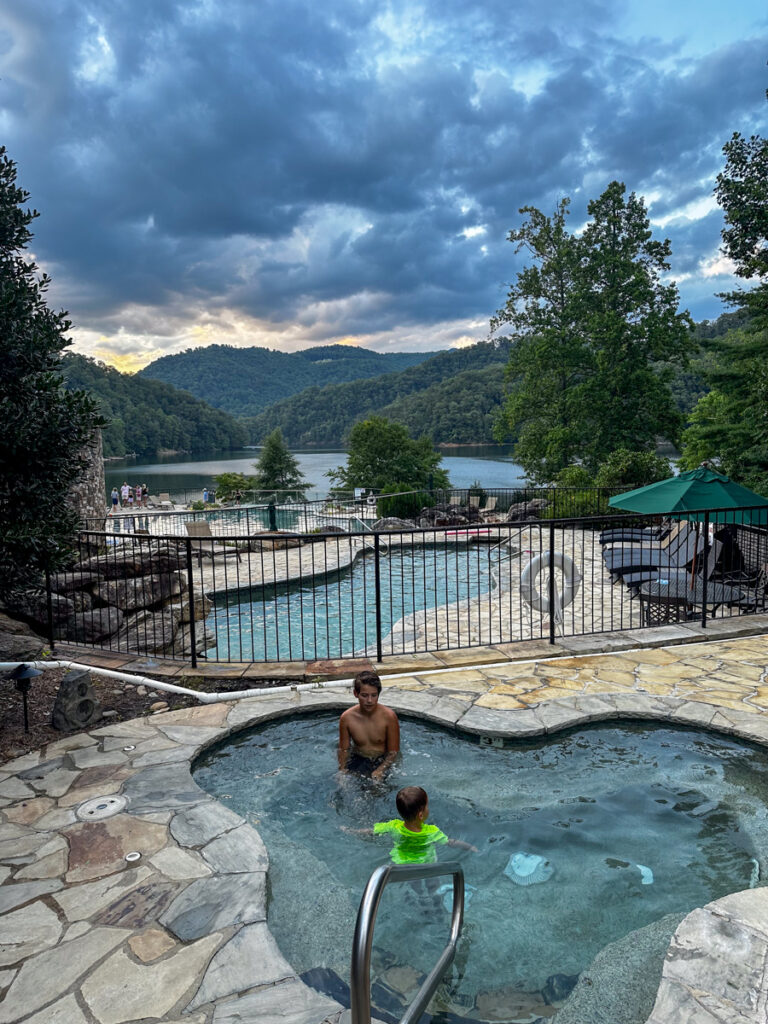 Kath Eats Blogger Kath Younger shares their Bear Lake Reserve vacation: in photo: two kids in a pool

