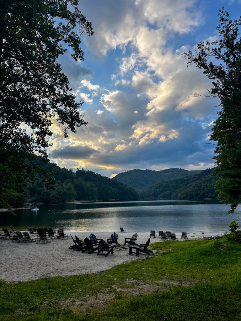 Kath Eats Blogger Kath Younger shares their Bear Lake Reserve vacation: in photo: lakeside with chairs
