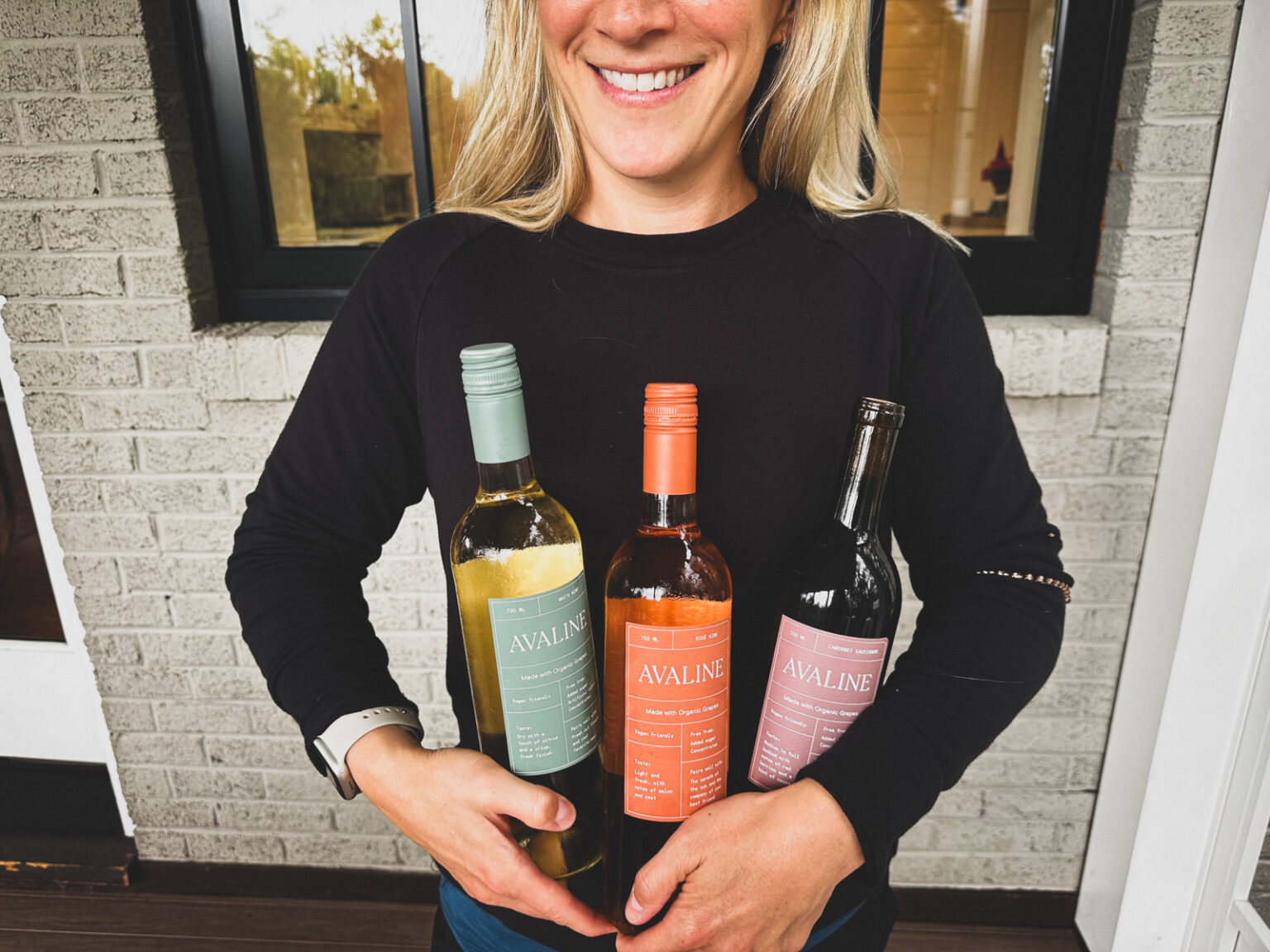 Kath Eats Blogger Kath Younger shares new finds for fall: in photo: Kath holding Avaline Wine