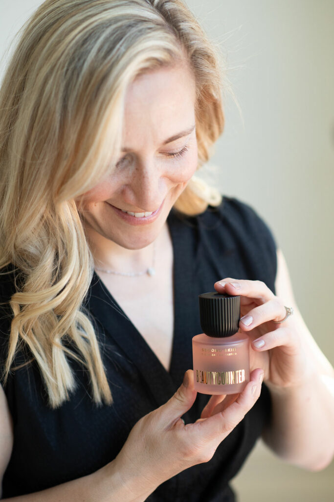 Kath Eats Blogger Kath Younger shares Beautycounter Sale - in photo: Kath holding a product from Beautycounter 