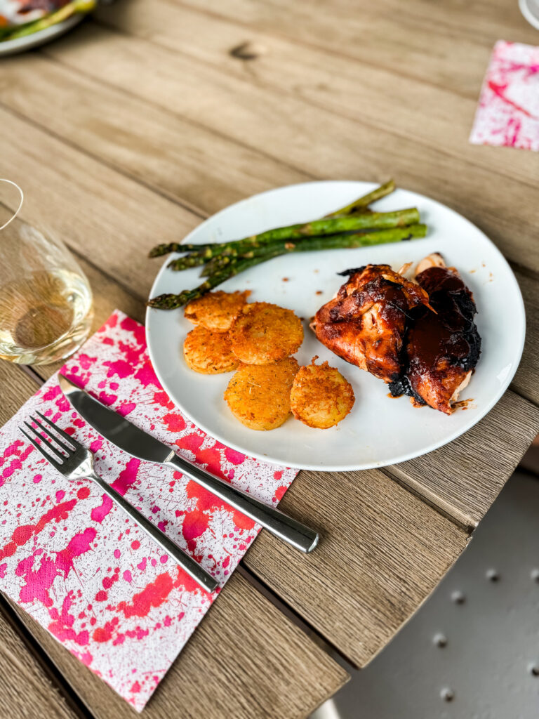 BBQ chicken with special breaded baked potato slices and asparagus