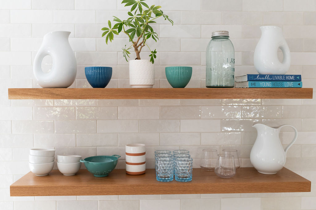 shelf with decor and glasses