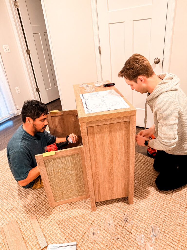 assembling furniture with friends
