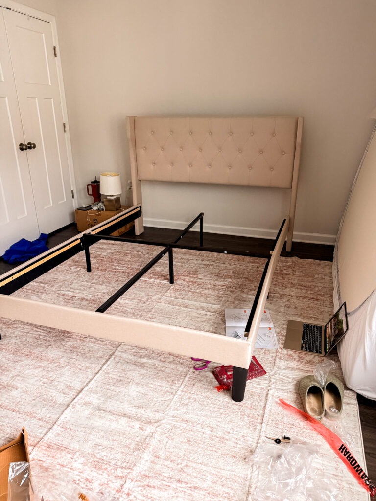 setting up bed frame in new home